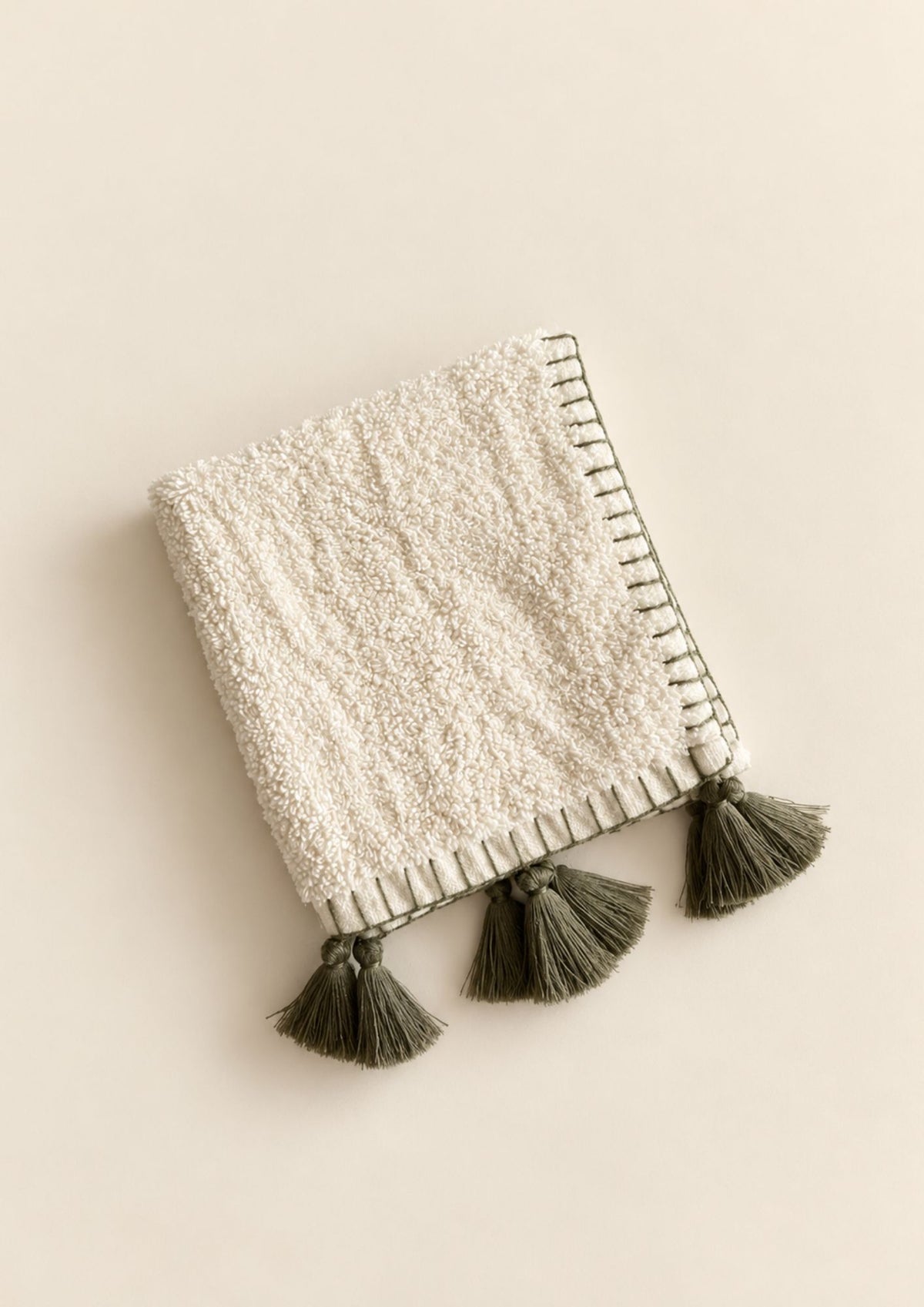 blanket stitch tasseled guest towel