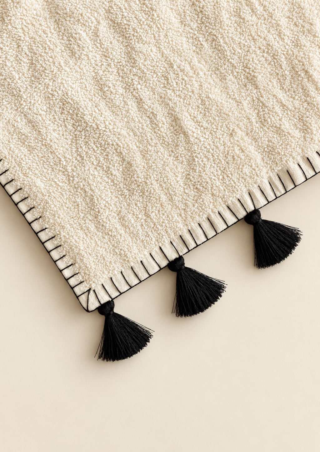 blanket stitch tasseled guest towel