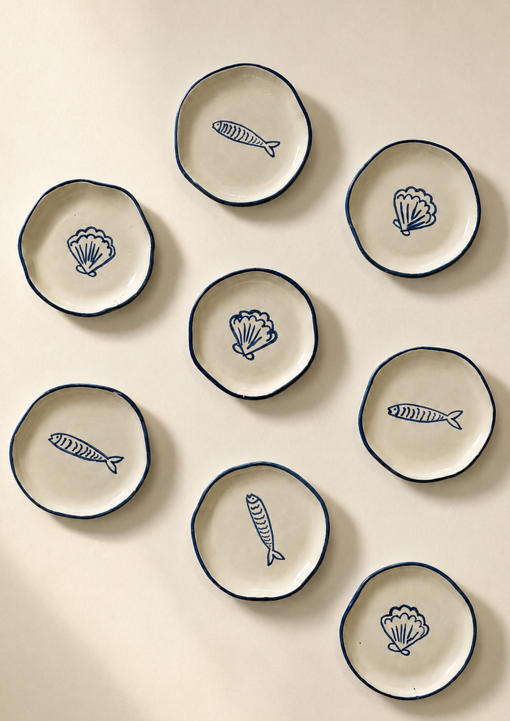 shell and sardine coasters